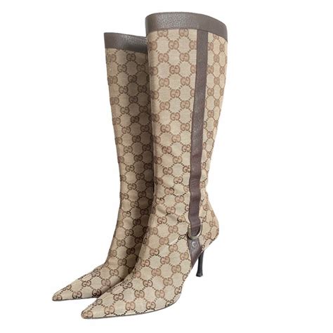 gucci monogram boots.